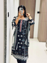 PURE LAWN PRINT WITH EXCLUSIVE HEAVY SELF EMBRODERY SUIT